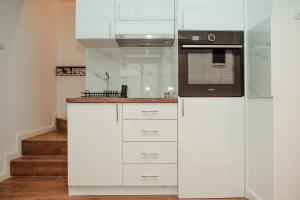 Kuchyň nebo kuchyňský kout v ubytování Passage apartment Subotica