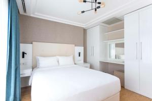 Postel nebo postele na pokoji v ubytování Radisson Residences Avrupa TEM Istanbul