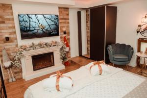 Postel nebo postele na pokoji v ubytování Passage apartment Subotica