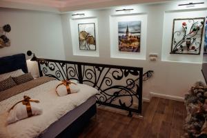 Postel nebo postele na pokoji v ubytování Passage apartment Subotica
