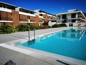 a large swimming pool in front of a building at AGAETE PARADISE in Puerto de las Nieves