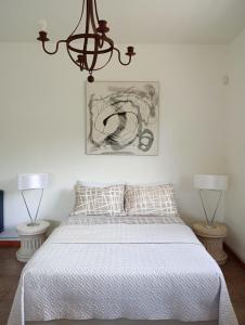 Een bed of bedden in een kamer bij Loft Las Acacias