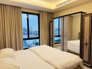 REMAZ ROSE BOULEVARD客房内的一张或多张床位