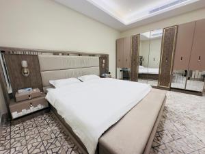 REMAZ ROSE BOULEVARD客房内的一张或多张床位