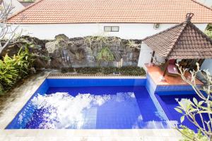 Der Swimmingpool an oder in der Nähe von Rumah Akira Seminyak