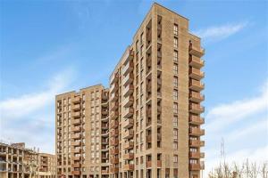 a tall building with balconies on the side of it at City Escape - Unwind in Style in Barking