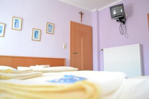 Postel nebo postele na pokoji v ubytování Gasthof Redl