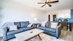 a living room with a couch and a table at Contemporary Condo in Hub of Old Town Scottsdale in Scottsdale