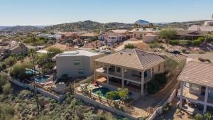 an aerial view of a home in a subdivision at Fabulous 4-Bdrm WBreathtaking Views & Pool in Fountain Hills