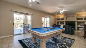 a living room with a pool table in it at Fabulous 4-Bdrm WBreathtaking Views & Pool in Fountain Hills