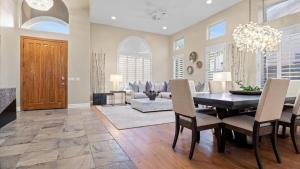 a dining room with a table and chairs at Massive North Scottsdale 6 bdrm w Oasis Backyard in Phoenix