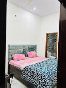 Postelja oz. postelje v sobi nastanitve Hotel D9 Kurukshetra , Kurukshetra