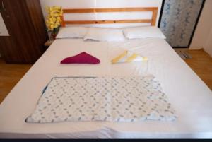 Cama o camas de una habitación en Arya Cottages