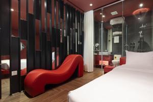 Postel nebo postele na pokoji v ubytování Jacayl Hotel HD