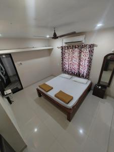 Letto o letti in una camera di Konkan Villa Dream