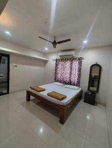Letto o letti in una camera di Konkan Villa Dream