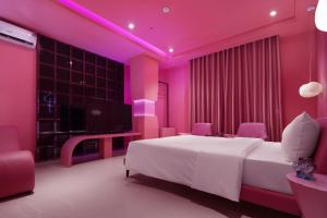 Postel nebo postele na pokoji v ubytování Jacayl Hotel HD