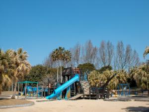 a playground in a park with a slide at TennenOnsen Hinatanoyado Nichinan Miyazaki - Vacation STAY 18651v in Nichinan
