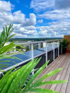 a balcony with a view of the water on a building at Penthouse in the city center in Rovaniemi +26 photos
