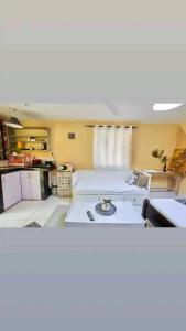 a view of a room with a kitchen and a room with at LOFTY DIANI STUDIO'S in Kwale +14 photos