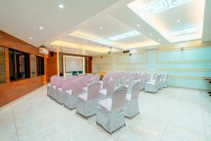 a room with rows of chairs in a classroom at Treebo Trend Express Inn in Mumbai