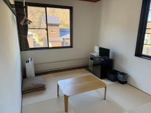 Posezení v ubytování K・Lodge
