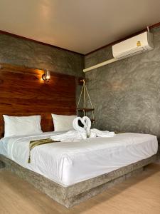 Postel nebo postele na pokoji v ubytování Rinna Resort
