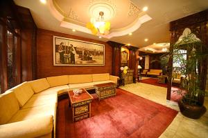 Χώρος καθιστικού στο Nirvana Boutique Hotel
