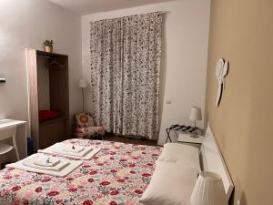 Postel nebo postele na pokoji v ubytování B&B Via Fontana Milano