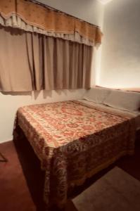 Cama ou camas em um quarto em Kingking and Gonggong’s Boardinghouse