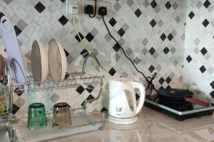 Photo de la galerie de l'établissement 9 pax @ 3 rooms TT3Soho Kuching, à Kuching 19 autres photos