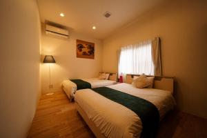 A bed or beds in a room at Yufusouin - Vacation STAY 85705