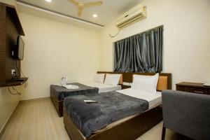 TV a/nebo společenská místnost v ubytování THE PARK AVENUE HOTEL - Business Class Hotel Near Central Railway Station Chennai Periyamet + 37 fotografií