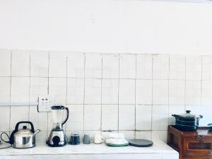 Kuhinja oz. manjša kuhinja v nastanitvi Enugu Apartments