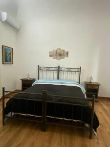 Posteľ alebo postele v izbe v ubytovaní Arco del vescovo 1