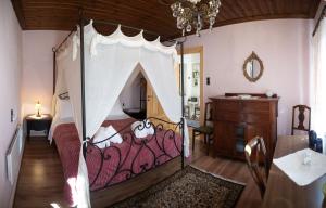 Posteľ alebo postele v izbe v ubytovaní Gorianades Traditional House