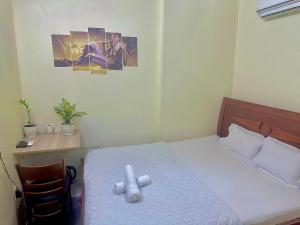 Postel nebo postele na pokoji v ubytování 158A Hotel