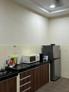 Kuchyň nebo kuchyňský kout v ubytování Homestay Hajrah + 5 fotografií