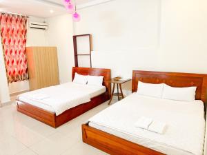 Postel nebo postele na pokoji v ubytování 158A Hotel