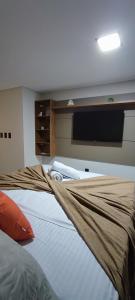 カベデロにあるSummer Flat Ap308 Intermaresのベッドルーム1室(ベッド2台、薄型テレビ付)