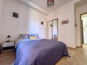 מיטה או מיטות בחדר ב-My Cosy Flat-Centre of Nice- Perfect location