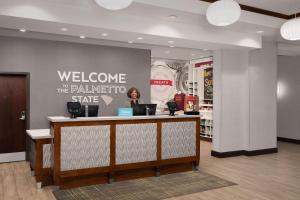 a lobby with a welcome to the palmettoknife store at Hampton Inn & Suites Orangeburg, SC in Orangeburg