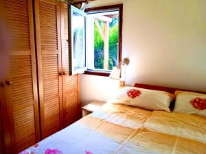 En eller flere senge i et værelse på Casa Mira, Ruhiger Bungalow in Las Norias