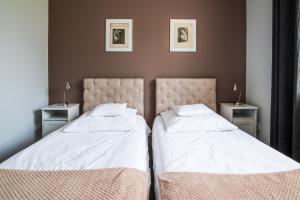 Posteľ alebo postele v izbe v ubytovaní Apartamenty Algador