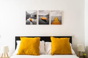 Ένα ή περισσότερα κρεβάτια σε δωμάτιο στο The Base - Comfort a Milano