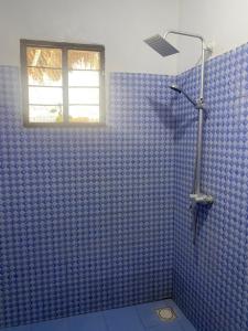 Ett badrum på Milele Lodge