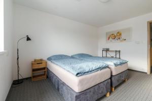 Postel nebo postele na pokoji v ubytování APARTMÁN Abertamská Chata