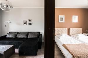 Posteľ alebo postele v izbe v ubytovaní Apartamenty Algador