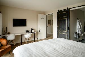Ένα ή περισσότερα κρεβάτια σε δωμάτιο στο B&B de Cley