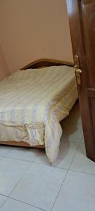 Un ou plusieurs lits dans un hébergement de l'établissement Golden villa @Labone
